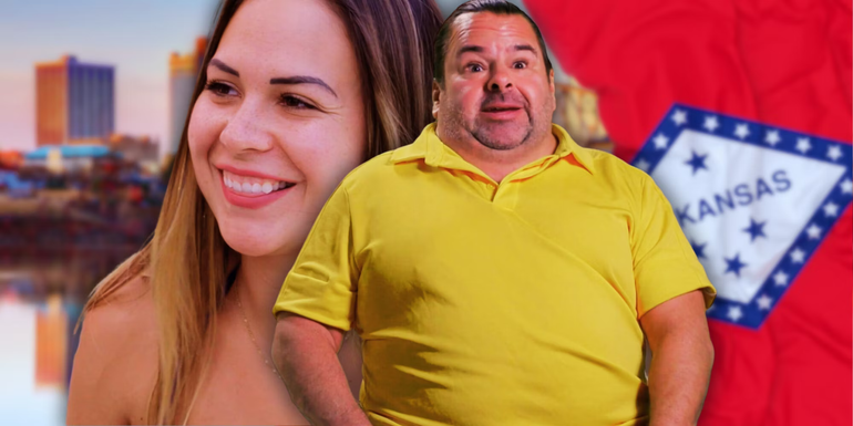 90 Day: The Last Resort's Big Ed & Liz Woods smiling next to an Arkansas flag