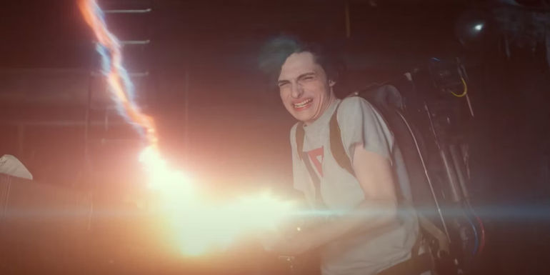 Finn Wolfhard wielding a proton pack in Ghostbusters: Frozen Empire.