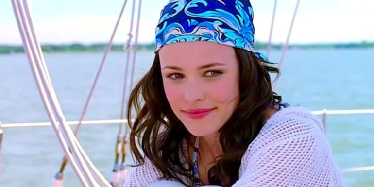 Rachel McAdams sitting on a boat in Wedding Crashers.