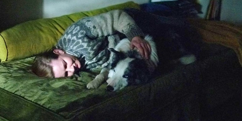 Sandra cuddles with Snoop at the end of Anatomy of a Fall