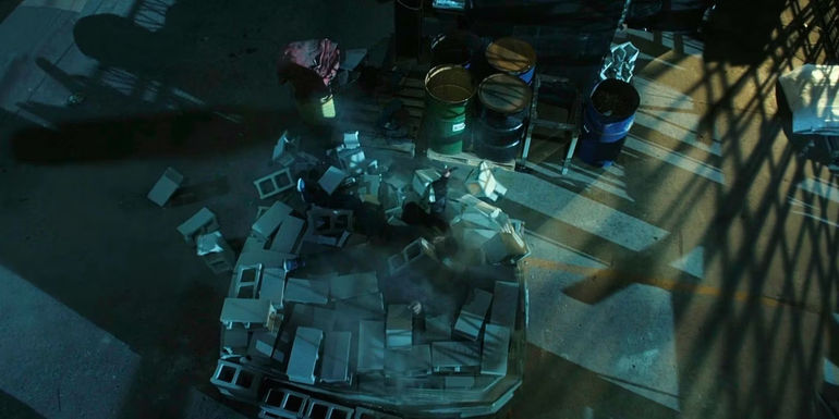 Enemy lying on cinder blocks in Reacher season 2