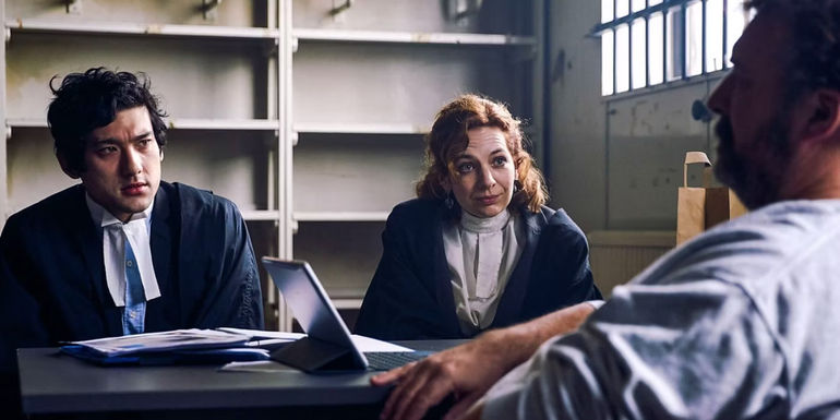 Will Sharpe and Katherine Parkinson talk to an inmate in Defending The Guilty