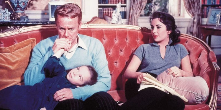 Helen, Charles and their daughter on a couch in The Last Time I Saw Paris