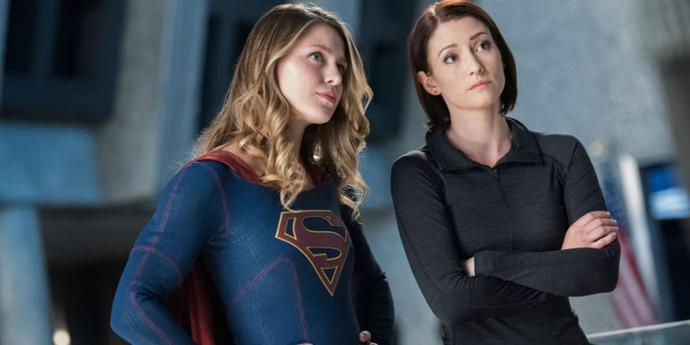 Chyler Leigh in Supergirl standing with Sentinel.