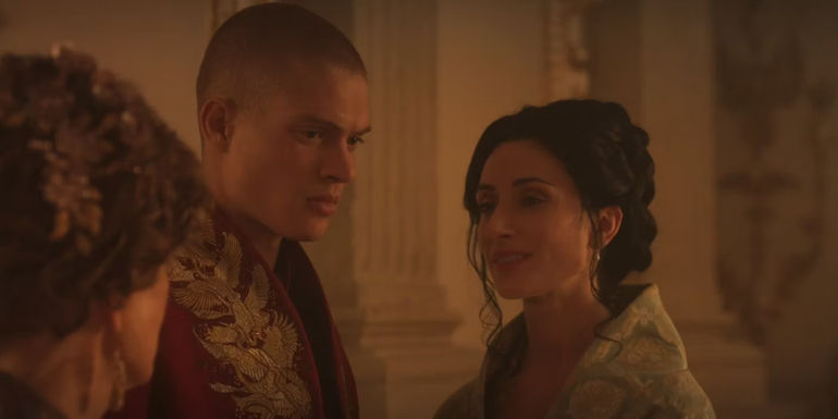 Rand and Selene socializing at a party in Wheel of Time