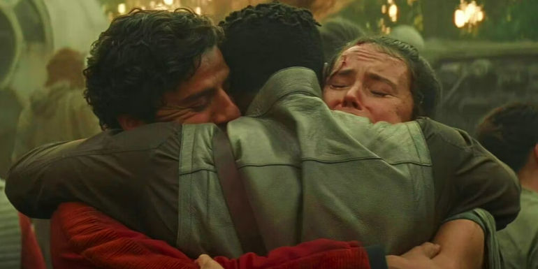 The Rise of Skywalker's central trio of Rey, Finn, and Poe hugging.