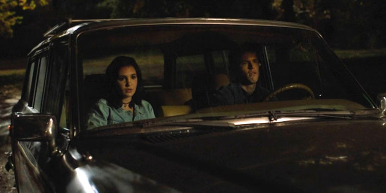 Young Shauna and Jeff sitting in his car in Yellowjackets' pilot episode
