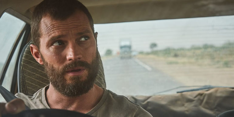 Jamie Dornan driving a car in The Tourist