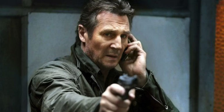 Bryan Mills talking on the phone in Taken
