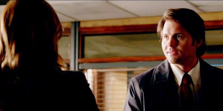 Caleb Brown (Kristoffer Polaha) and Beckett (Stana Katic) shaking hands in Castle.