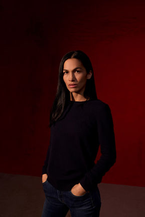 Elodie Yunt The Cleaning Lady season 3 promo on red background