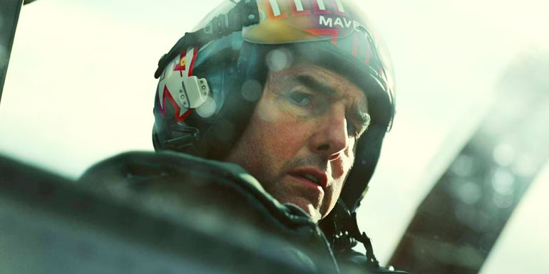 Tom Cruise looking over his shoulder as Maverick in Top Gun: Maverick