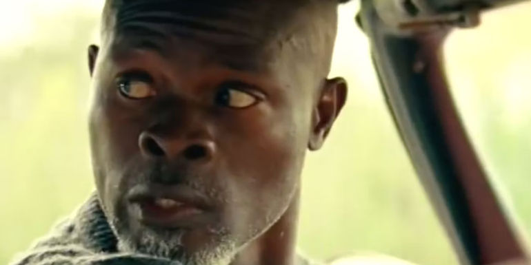 Djimon Hounsou as Man on the Island looks over his shoulder in A Quiet Place II.