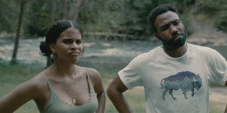Zazie Beetz as Vanessa and Donald Glover as Earn with their hands on their hips in Atlanta season 4 episode 7