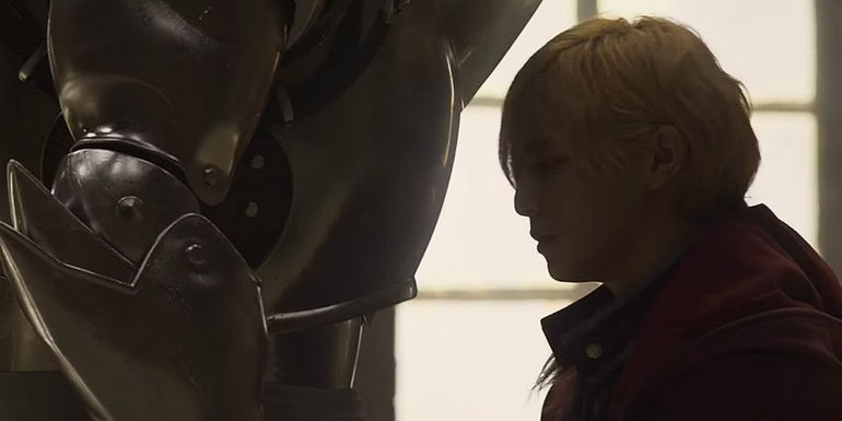 Edward Elric facing a suit of armor in the live-action Fullmetal Alchemist