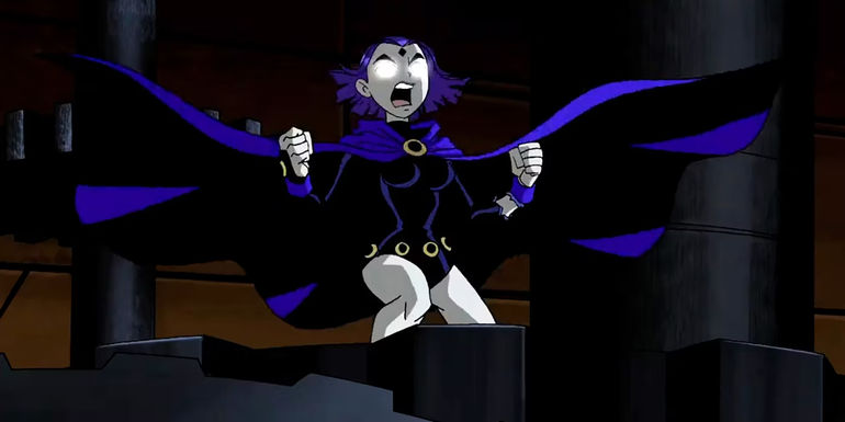 Raven screaming in anger while her eyes glow in Teen Titans.