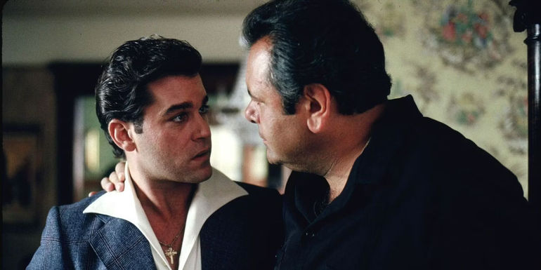Ray Liotta and Paul Sorvino looking at one another in Goodfellas 