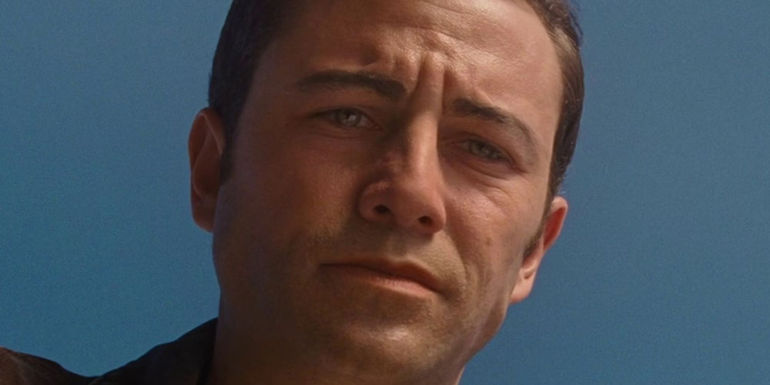 Jason Gordon-Levitt as Young Joe looking concerned in Looper