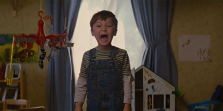 Pierce Gagnon screaming as Cid in Looper