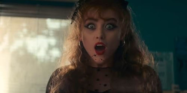 Kathryn Newton as Lisa Swallows looking shocked in a scene from Lisa Frankenstein.