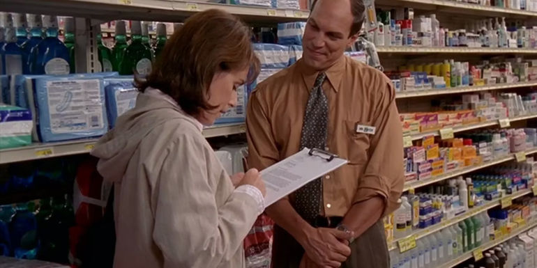Lois signing a statement for her boss at Lucky Aide in Malcolm in the Middle