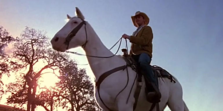 Francis on a horse in the episode Boys at Ranch
