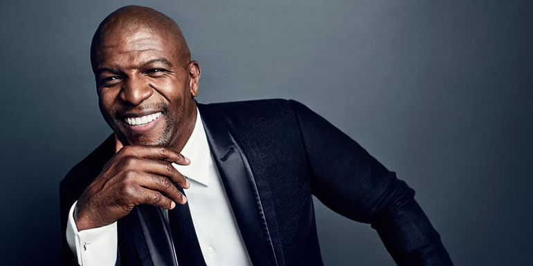 Terry Crews smmiling for the camera in Americas Got Talent