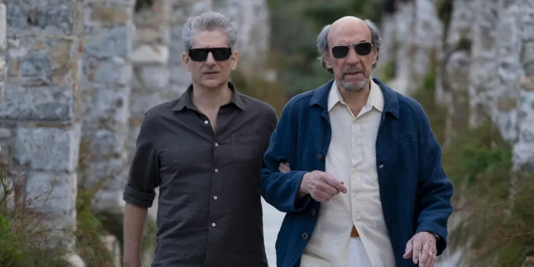 Dominic (Michael Imperioli) and Bert (F. Murray Abraham) walking around Sicily in The White Lotus