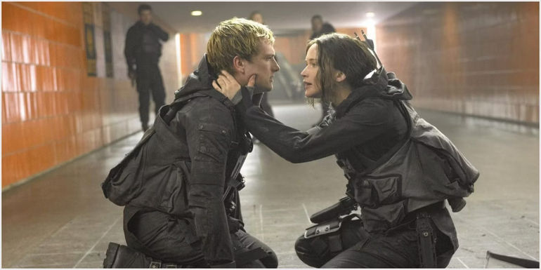 Katniss and Peeta kiss in The Hunger Games