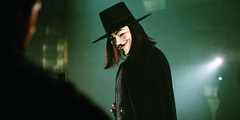 V looking menacing in green light in V for Vendetta.
