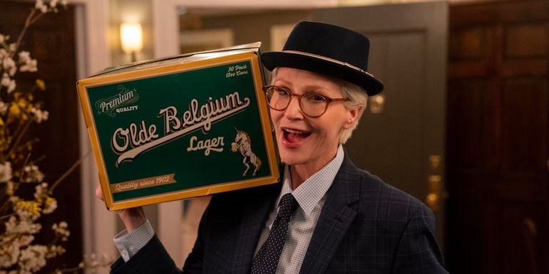 Jane Lynch as Sazz holding a case of beer in Only Murders in the Building season 3