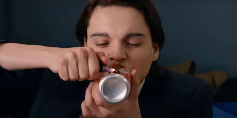 Marx Burkholder as John Bennett using a soda can to smoke weed in Ted
