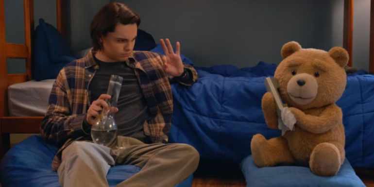 Marx Burkholder as John Bennett holding a bong while Ted talks on the phone in the Ted TV show