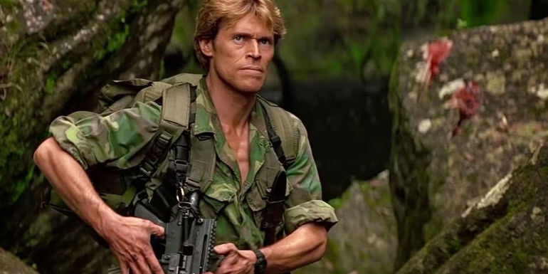 Willem Daffoe as John Clark in camouflage in jungle Clear and Present Danger 