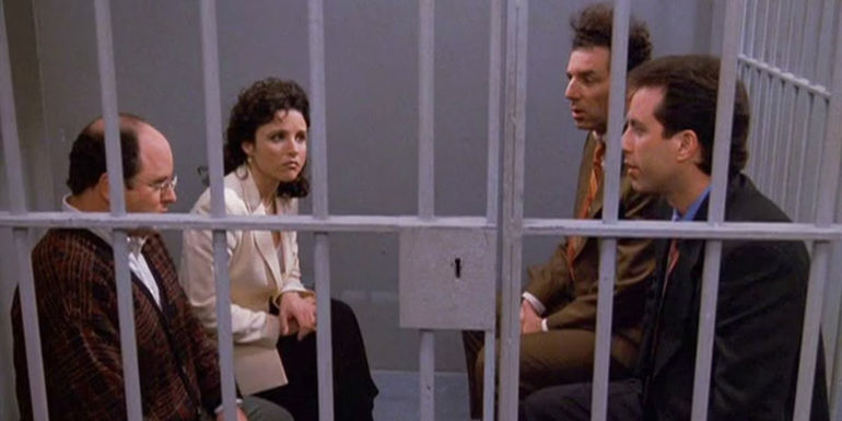 George, Elaine, Kramer, and Jerry sitting in a jail cell in Seinfeld's finale