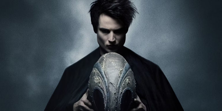 An image of Morpheus holding an egg like object in The Sandman