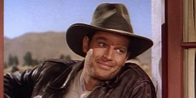 Charlton Heston's smiling Harry Steele looking like Indiana Jones in Secret of the Incas 1954