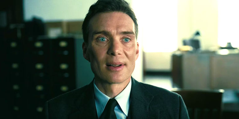 Oppenheimer (Cillian Murphy) smiles in Oppenheimer