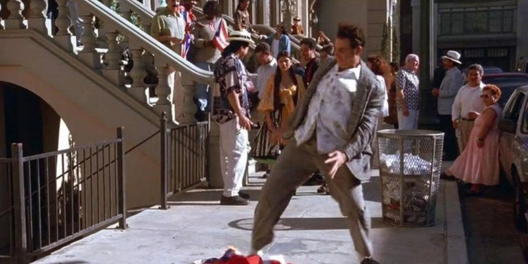 Michael Richards as Kramer standing on a flag in Seinfeld
