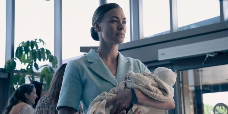 Serena holding her baby in The Handmaid's Tale.