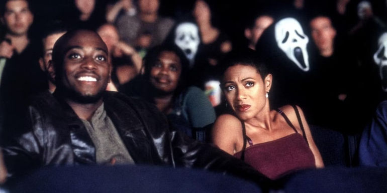 Phil (Omar Epps) and Maureen (Jada Pinkett Smith) watching Stab in Scream 2