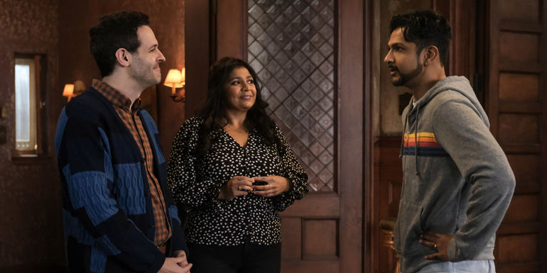 Jay looking disapprovingly at Bela and Eric in Ghosts season 3.