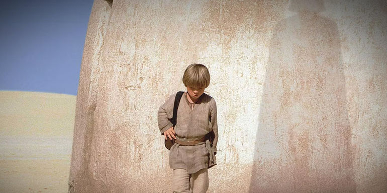 A Phantom Menace teaser poster shows young Anakin walking with a Shadow of Darth Vader behind him
