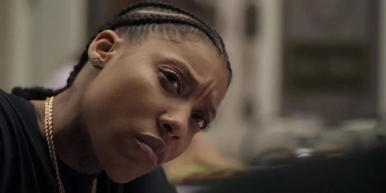 Chastity (Jonica Booth) tilting her head and looking confused in Rap Shit.