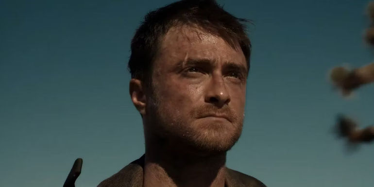 Daniel Radcliffe looking serious in Miracle Workers