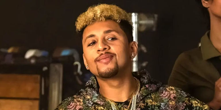 Francois (Jaboukie Young-White) smiling smugly in Rap Shit.