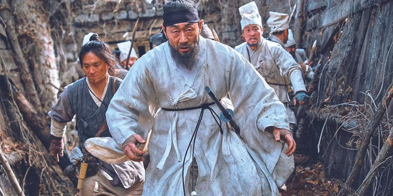 People run from a village in Kingdom