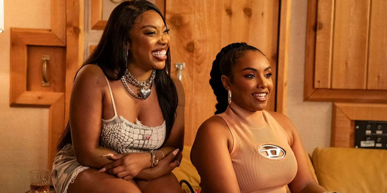 Mia (KaMillion) and Shawna (Aida Osman) smiling in Rap Shit.