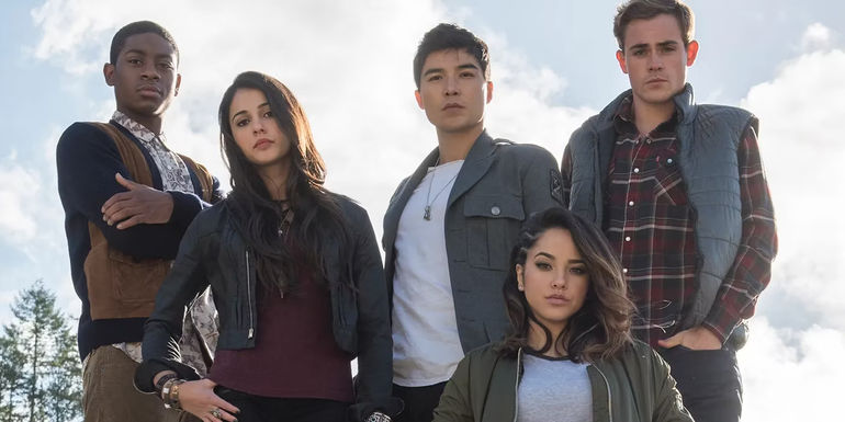 Billy, Kimberly, Zack, Trini, and Jason standing together in Power Rangers (2017)
