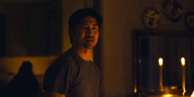 Brian Tee as Clarke Woo in Expats episode 5